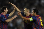 getty_xaviiniestamessi20121212