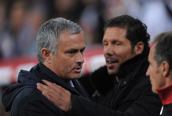 getty_mourinhosimeone20130518