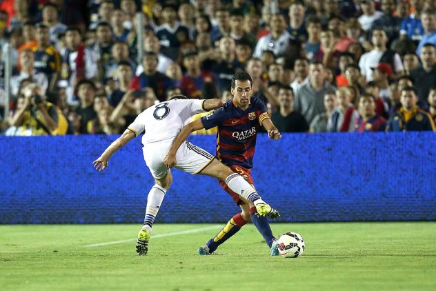 getty_gerrardbusquets20150721