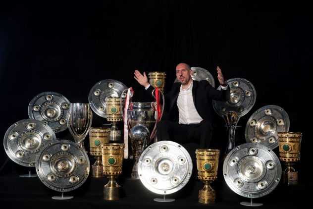 Arjen Robben And Franck Ribery Hand Over Championship And DFB Cup Trophy To FCB Erlebniswelt